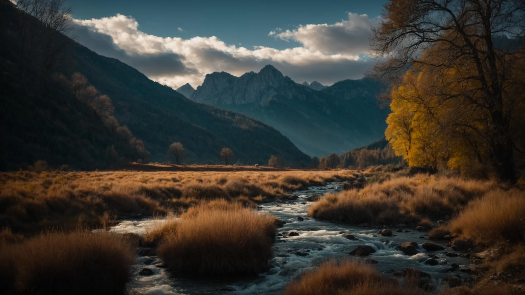 eine lebendige landschaft mit leuchtenden farben, in der eine majestätische bergkette im hintergrund ein strahlend blaues himmelsbild mit flauschigen, weißen wolken kontrastiert.